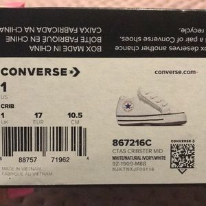 Converse Chuck Taylor’s white crib shoes